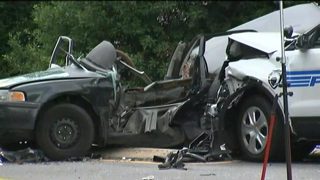 Woman dies after crashing into CMPD patrol car